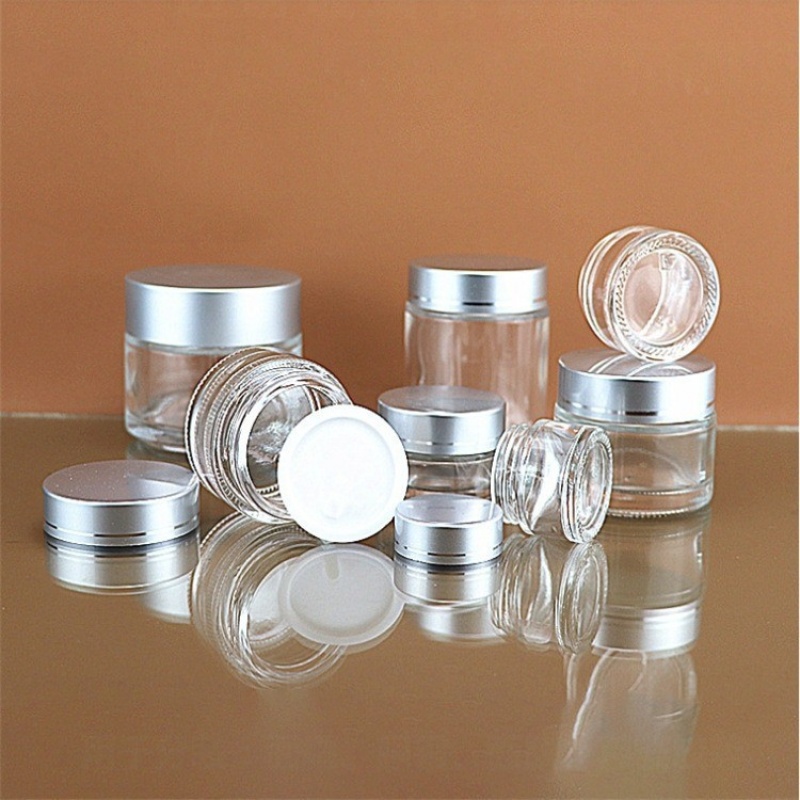 Wholesale transparent cream jars with black caps, face cream, eye cream, foundation cream, 10g portable sample bottles