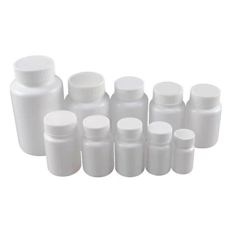 White solid bottles, 30g, 50g, 100g, pharmaceutical wide-mouth plastic bottles, powder/capsule dispensing bottles with caps.