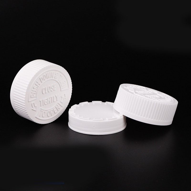 Double-layered childproof cap