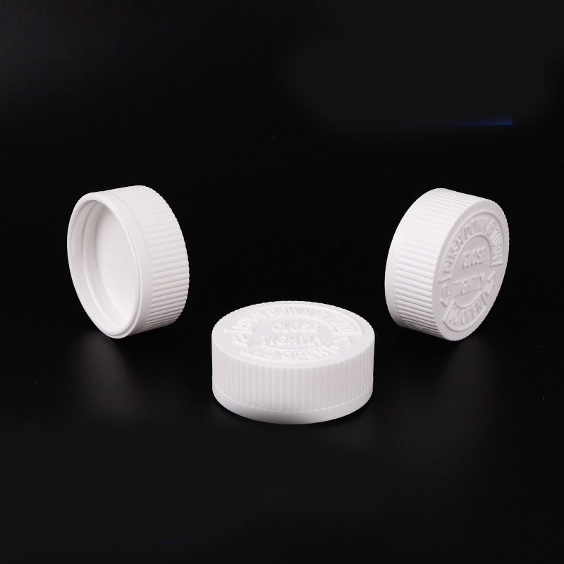 Double-layered childproof cap