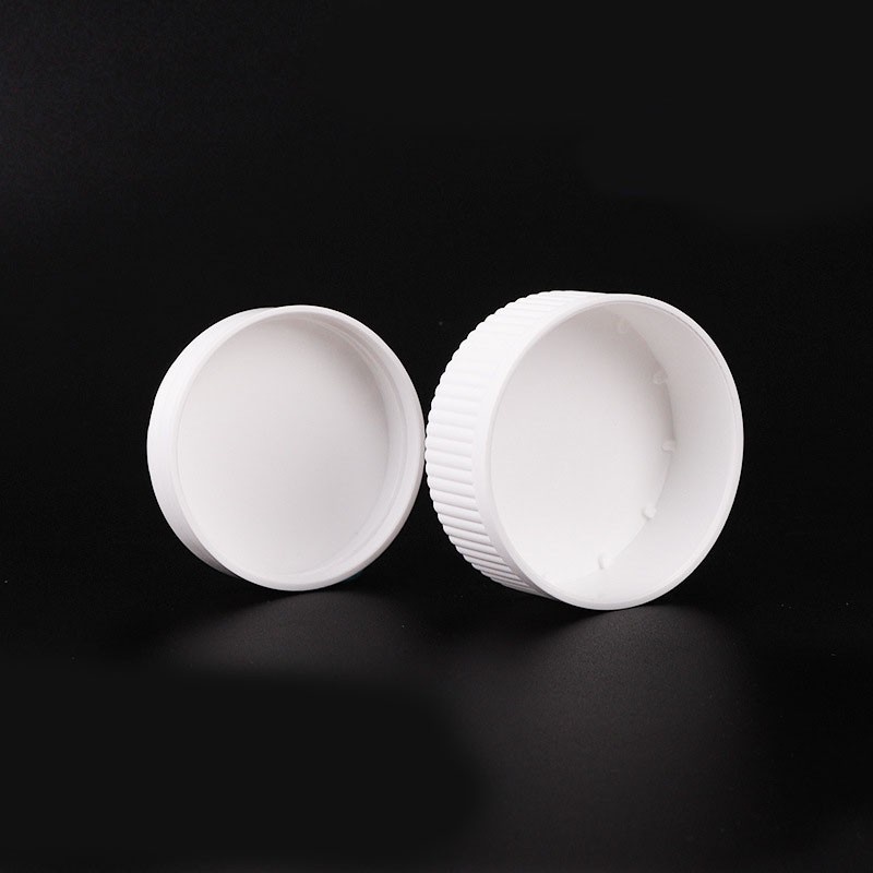 Double-layered childproof cap