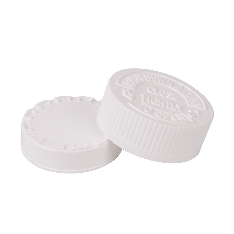 Double-layered childproof cap