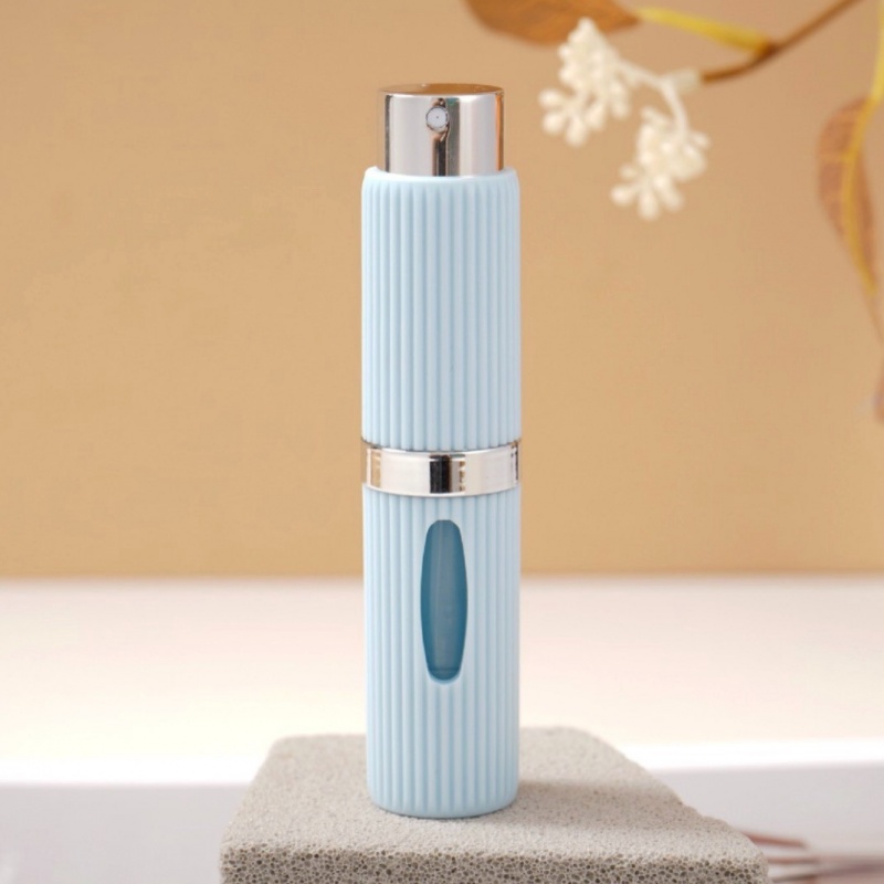 Spot Color 8ml Rotating Bottom Perfume Bottle Portable Plastic Spray Bottle Empty ABS Press Liquid Sub Bottle for Sale
